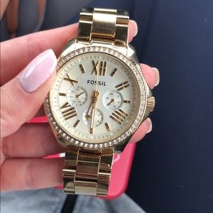 Gold fossil watch